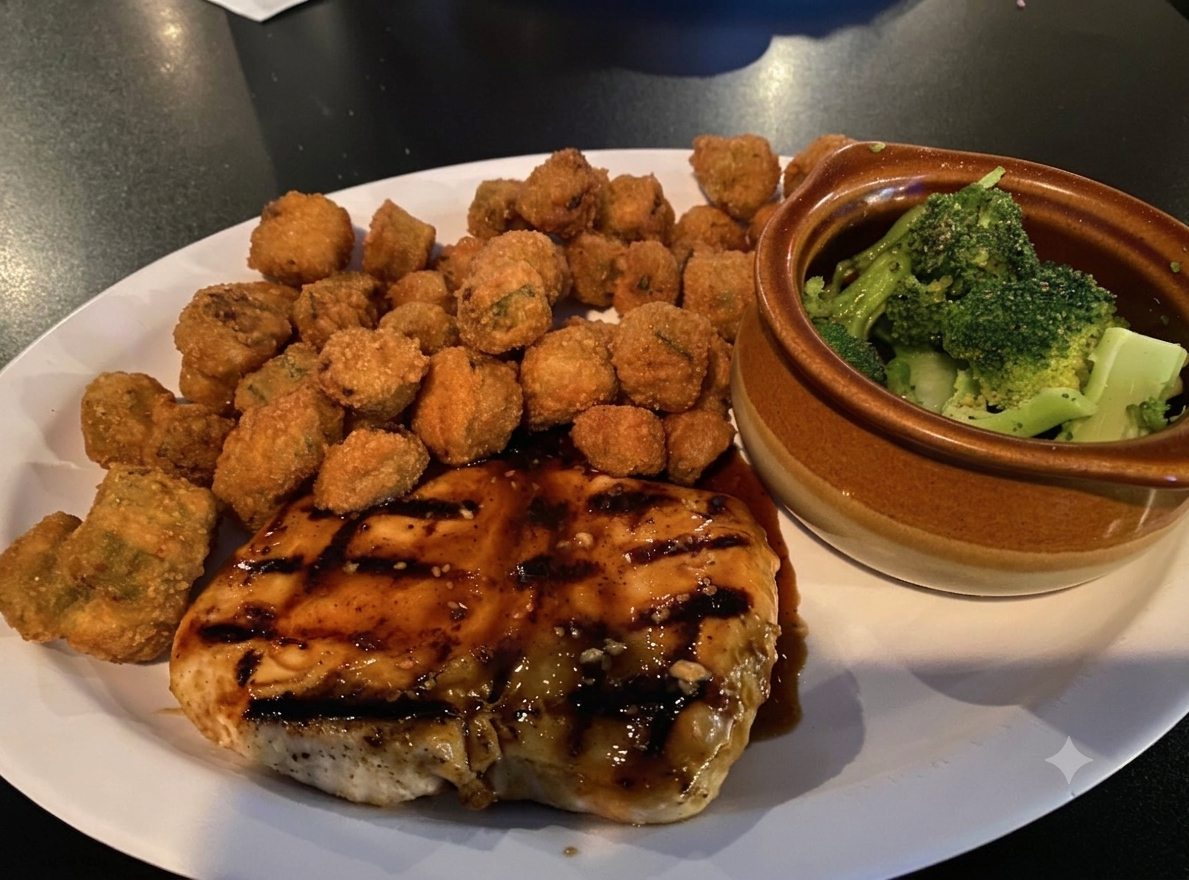 Grilled glazed chicken breast with fried okra and a crock of broccoli
